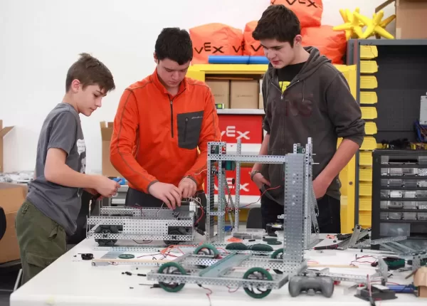 Three Teens Building Mechanics Set